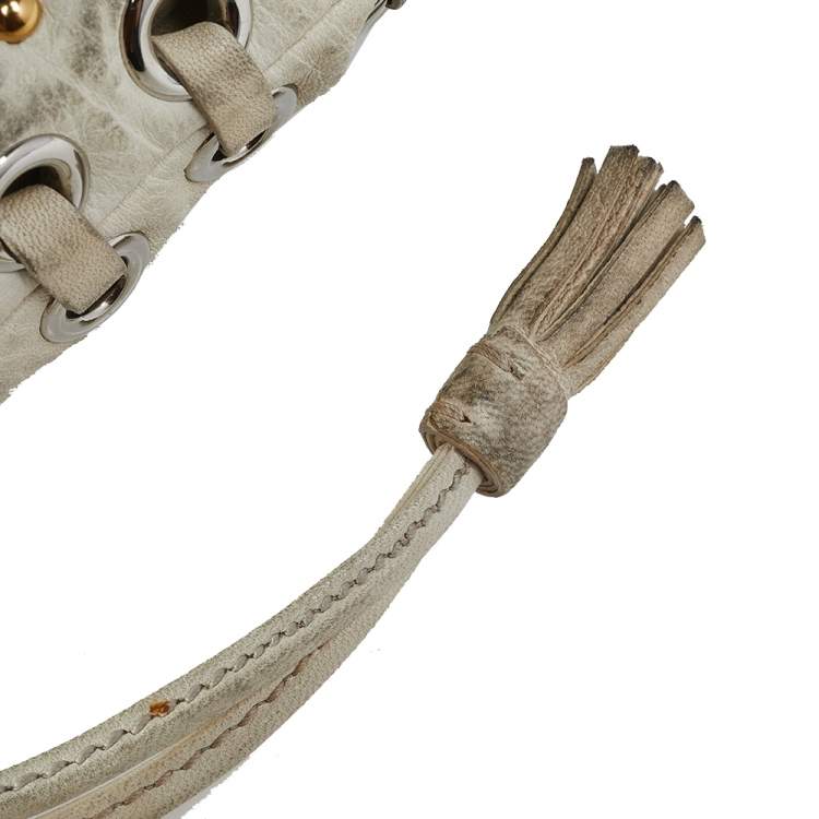 Pre Owned Miu Miu Off White Leather Studded Drawstring Bucket Bag
