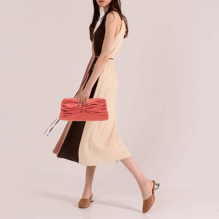 Pre Owned Miu Miu Coral Orange Leather Bow Kiss Lock Clutch