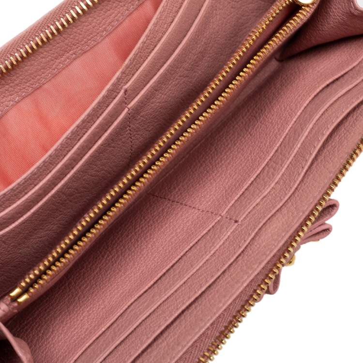 Pre Owned Miu Miu Pink Leather Studded Bow Crystal Embellished Zip Around Wallet
