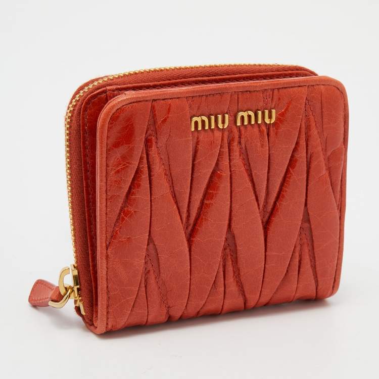 Pre Owned Miu Miu Orange Matelassé Leather Zip Around Compact Wallet