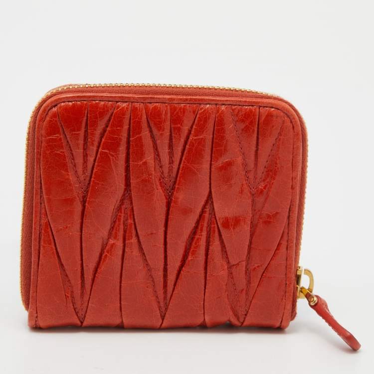 Pre Owned Miu Miu Orange Matelassé Leather Zip Around Compact Wallet