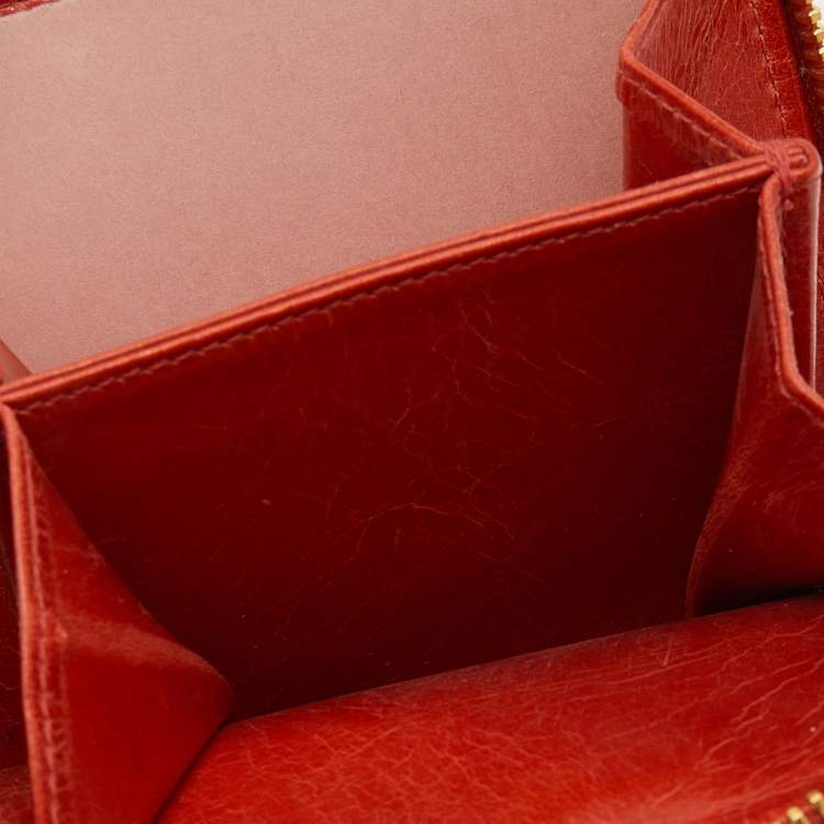 Pre Owned Miu Miu Orange Matelassé Leather Zip Around Compact Wallet