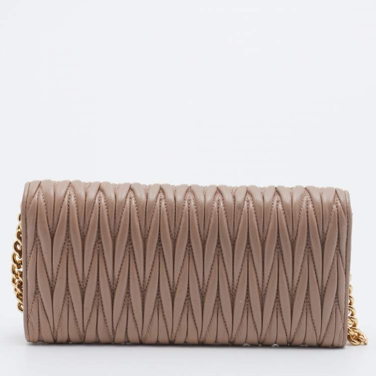 Pre Owned Miu Miu Beige Leather Matelasse Flap WOC Wallet