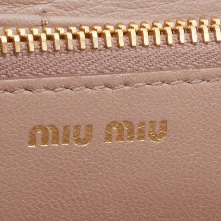Pre Owned Miu Miu Beige Leather Matelasse Flap WOC Wallet