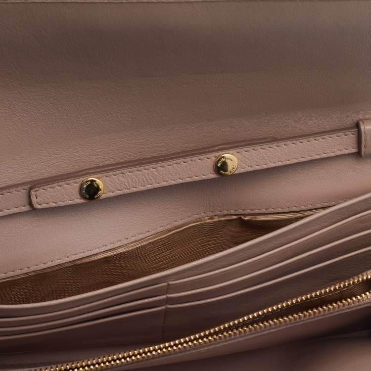 Pre Owned Miu Miu Beige Leather Matelasse Flap WOC Wallet