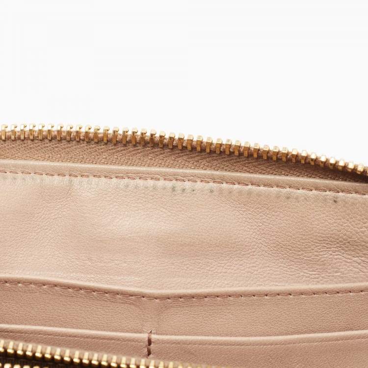 Pre Owned Miu Miu Beige Matelassé Leather Zip Around Wallet