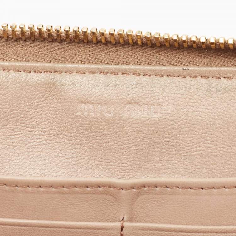 Pre Owned Miu Miu Beige Matelassé Leather Zip Around Wallet