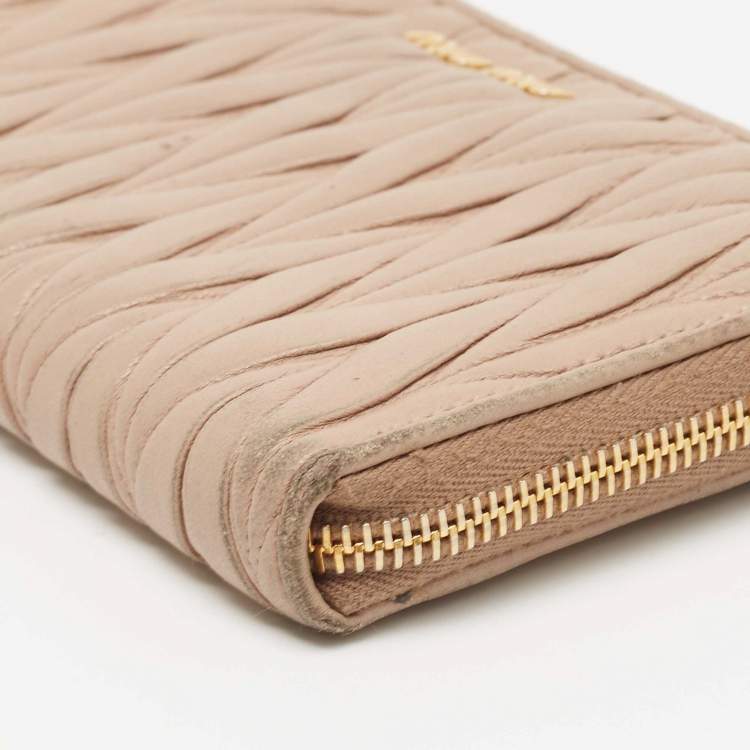 Pre Owned Miu Miu Beige Matelassé Leather Zip Around Wallet