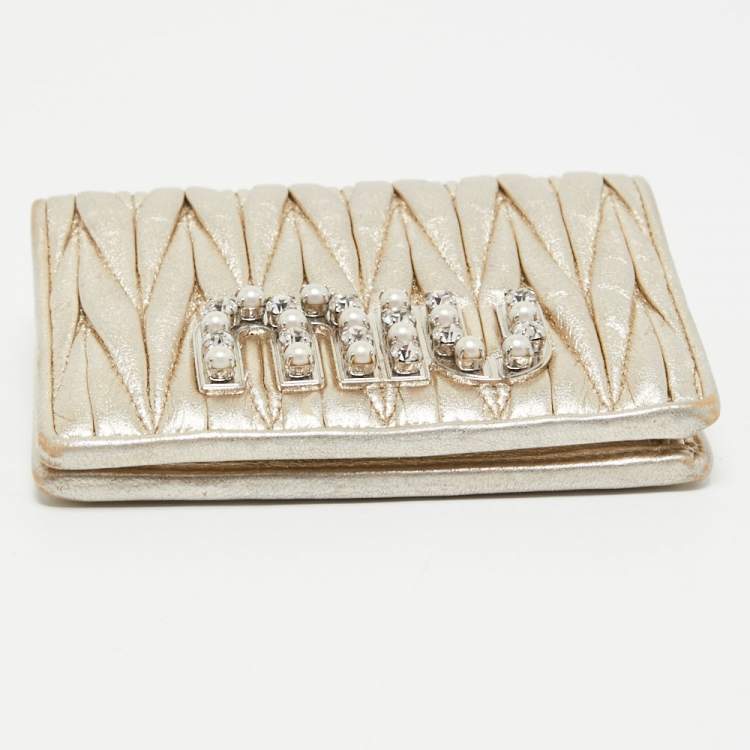 Pre Owned Miu Miu Gold Matelassé Leather Logo Flap Card Case 