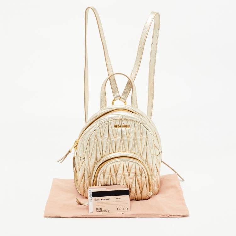 Pre Owned Miu Miu Gold Matelassé Leather Pocket Backpack 