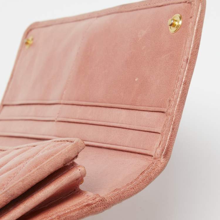 Pre Owned Miu Miu Peach Matelasse Leather Bow  Flap Continental Wallet