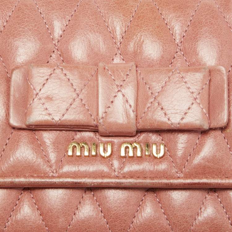 Pre Owned Miu Miu Peach Matelasse Leather Bow  Flap Continental Wallet