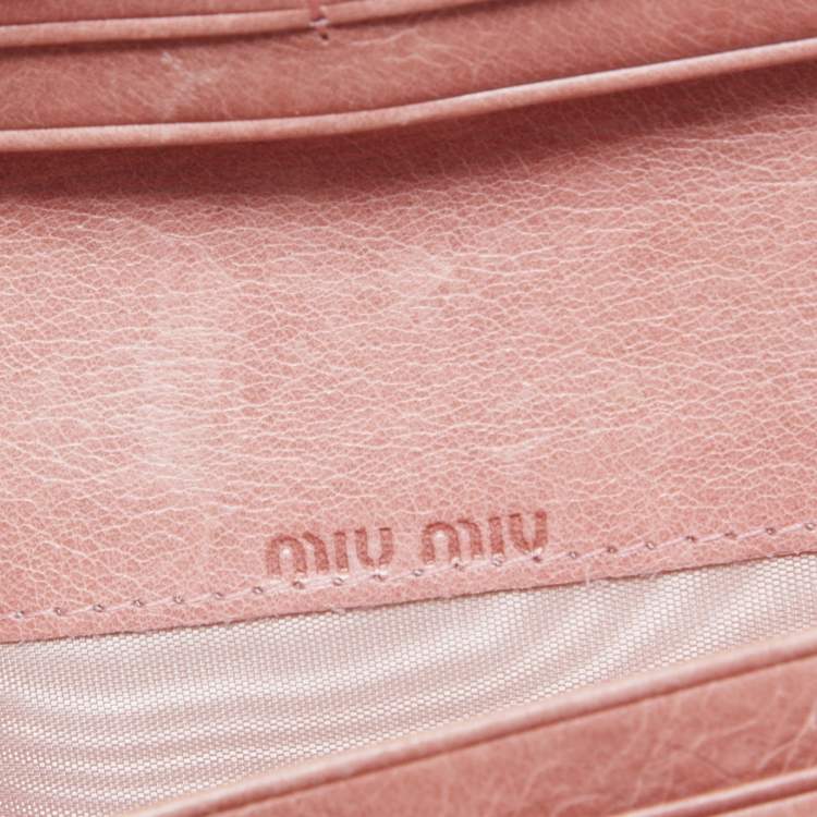 Pre Owned Miu Miu Peach Matelasse Leather Bow  Flap Continental Wallet