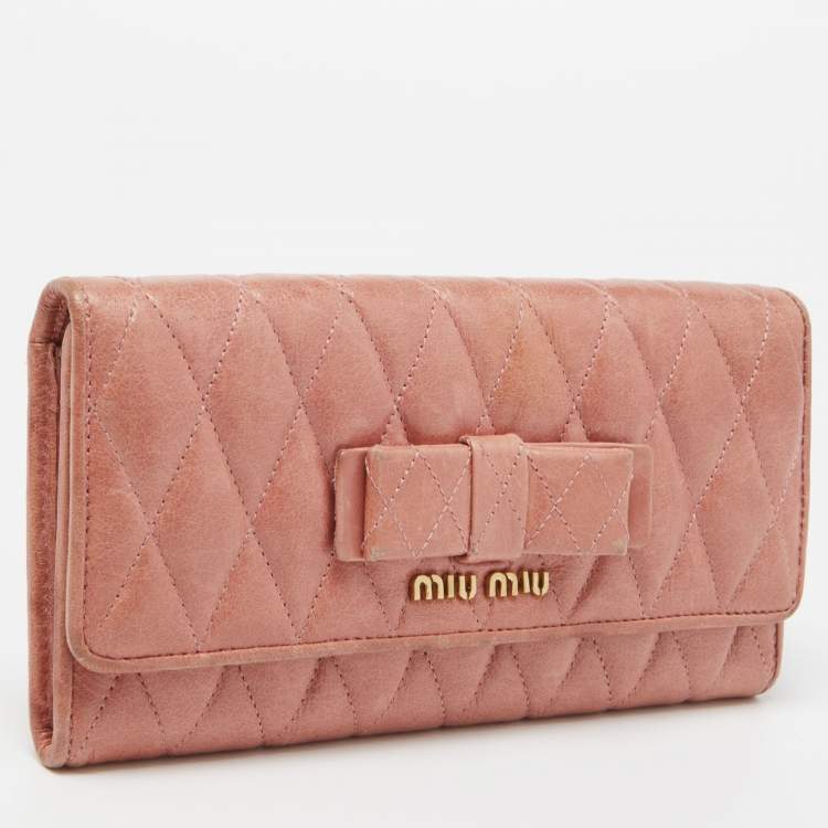 Pre Owned Miu Miu Peach Matelasse Leather Bow  Flap Continental Wallet