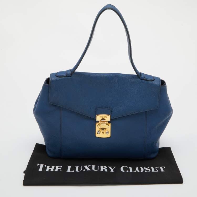 Pre Owned Miu Miu Blue Grained Leather Pushlock Top Handle Bag
