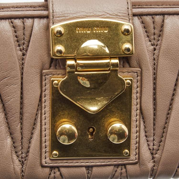 Pre Owned Miu Miu Beige Matelassé Leather Key Lock Continental Wallet