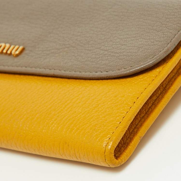 Pre Owned Miu Miu Grey/Yellow Madras Leather Flap Continental Wallet