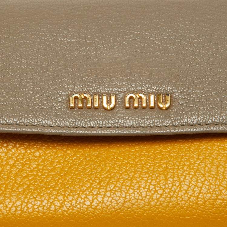 Pre Owned Miu Miu Grey/Yellow Madras Leather Flap Continental Wallet