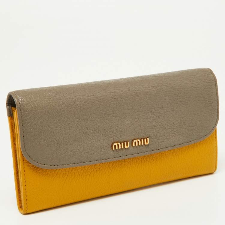 Pre Owned Miu Miu Grey/Yellow Madras Leather Flap Continental Wallet