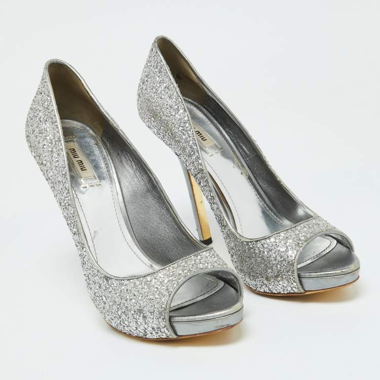 Pre Owned Miu Miu Silver Glitter and Leather Peep Toe Platform Pumps Size 41