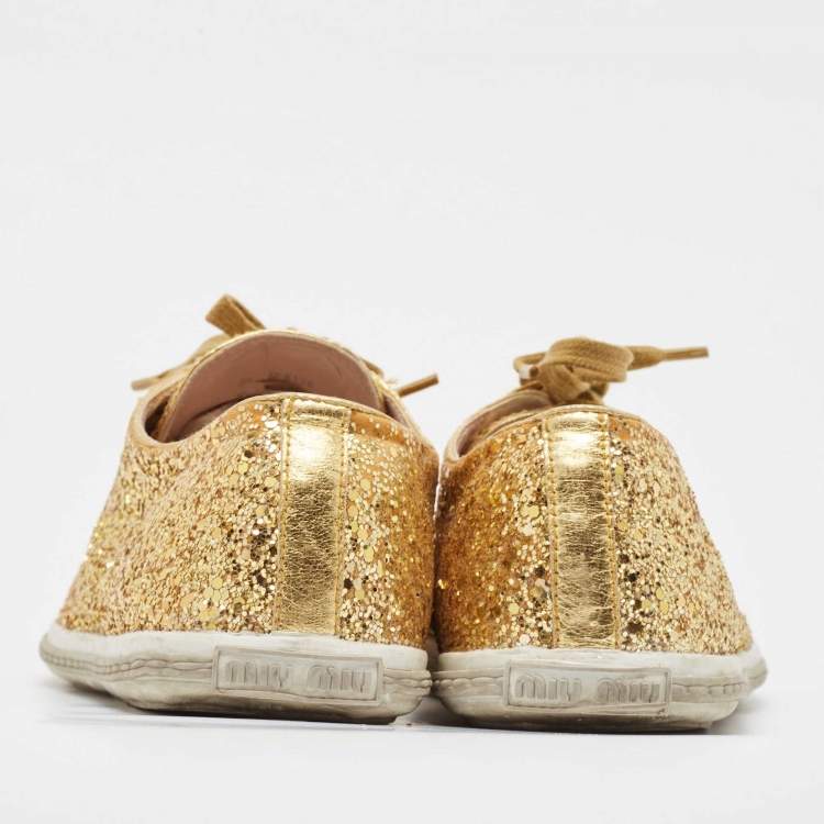 Pre Owned Miu Miu Gold Glitter and Leather Low Top Sneakers Size 39