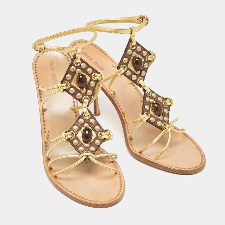Pre Owned Miu Miu Gold Leather Crystal Embellished Ankle Strap Sandals Size 38.5