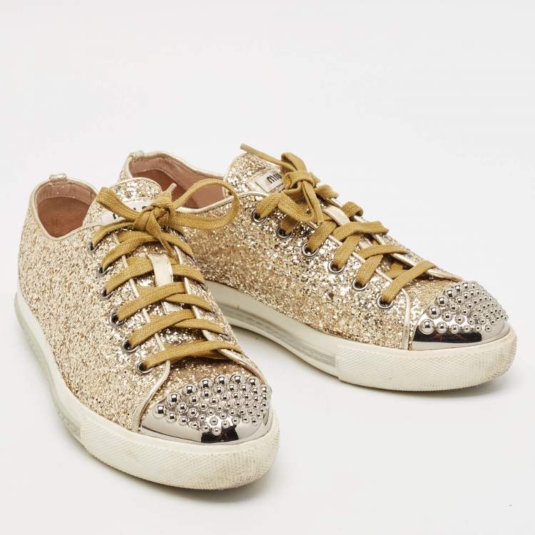 Pre Owned Miu Miu Gold Coarse Glitter Metal Cap Toe Low Top Sneakers Size 37.5