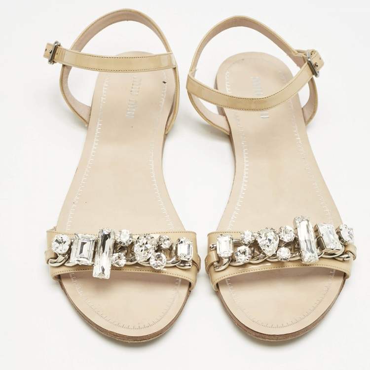 Pre Owned Miu Miu Beige Patent Leather Cipraia Crystal Ankle Strap Flat Sandals Size 37.5