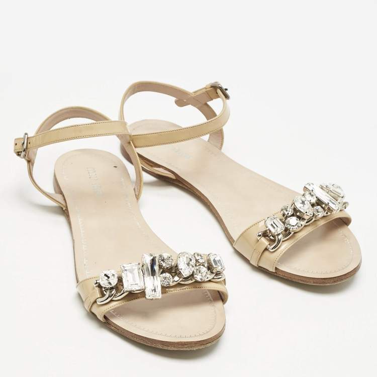 Pre Owned Miu Miu Beige Patent Leather Cipraia Crystal Ankle Strap Flat Sandals Size 37.5