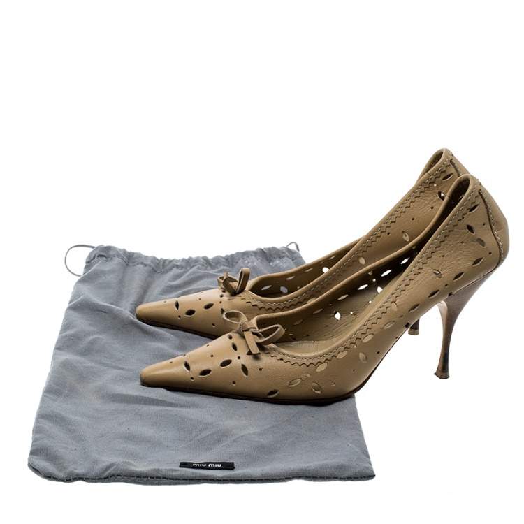 Pre Owned Miu Miu Beige Laser Cut Leather Bow Detail Pumps Size 38