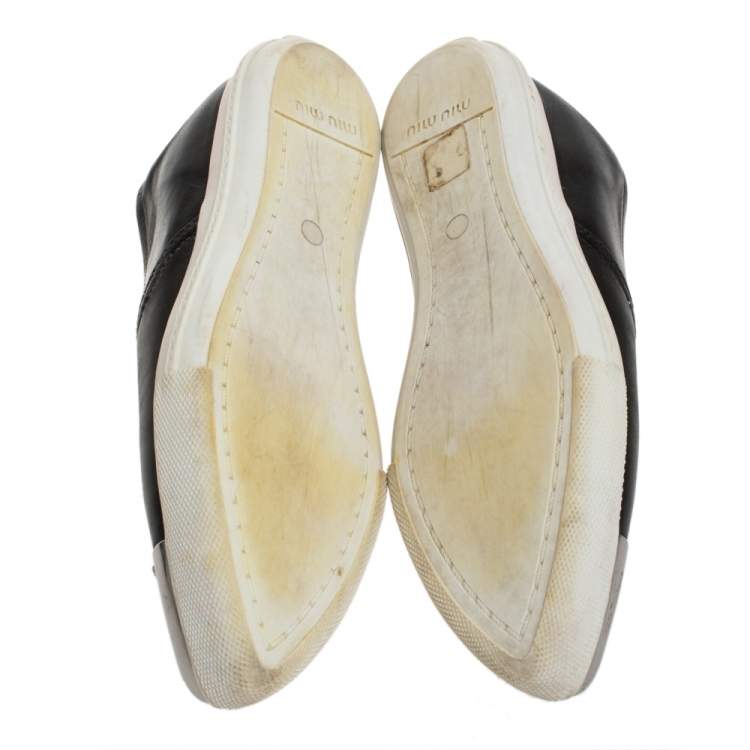 مملوكة مسبقًا Miu Miu Black Leather Metal Cap Toe Sneakers Size 38.5