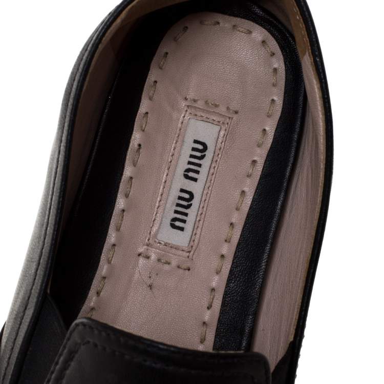 مملوكة مسبقًا Miu Miu Black Leather Metal Cap Toe Sneakers Size 38.5