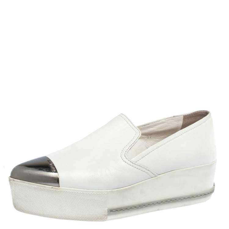 white slip on platform shoes