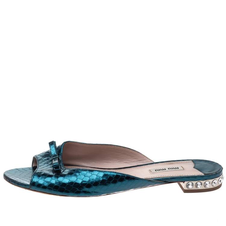 Pre Owned Miu Miu Metallic Teal Snakeskin Effect Leather Bow Detail Jeweled Heel Flat Slides Size 41