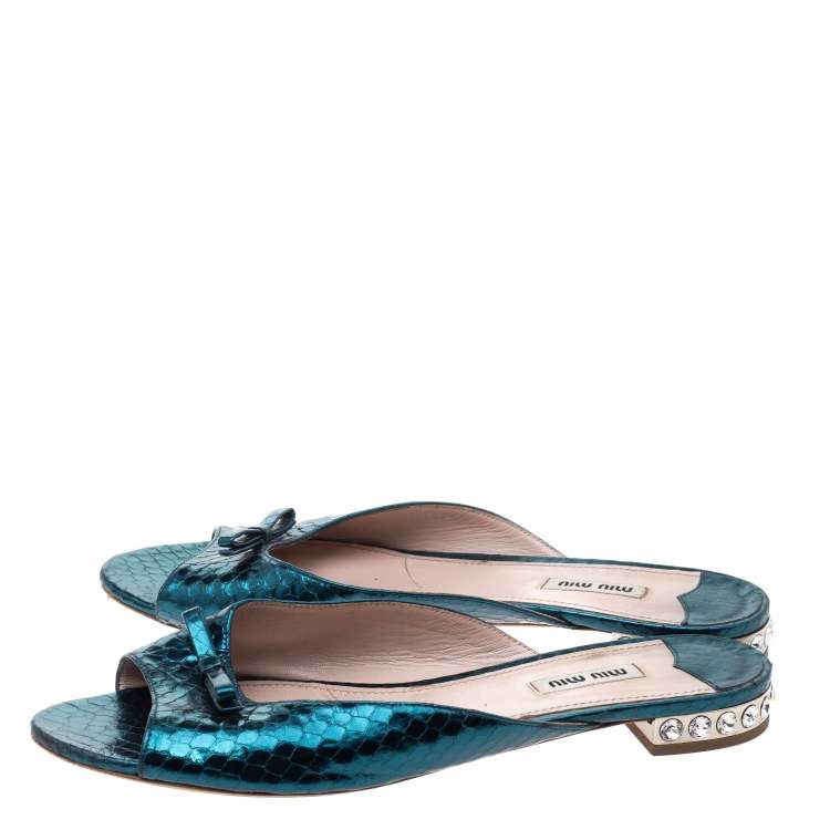 Pre Owned Miu Miu Metallic Teal Snakeskin Effect Leather Bow Detail Jeweled Heel Flat Slides Size 41