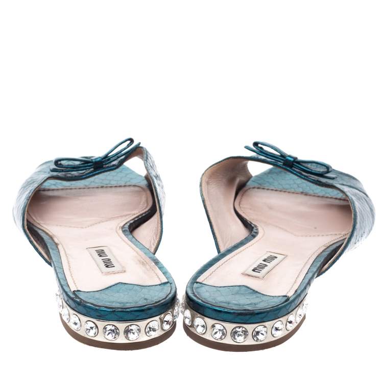 Pre Owned Miu Miu Metallic Teal Snakeskin Effect Leather Bow Detail Jeweled Heel Flat Slides Size 41