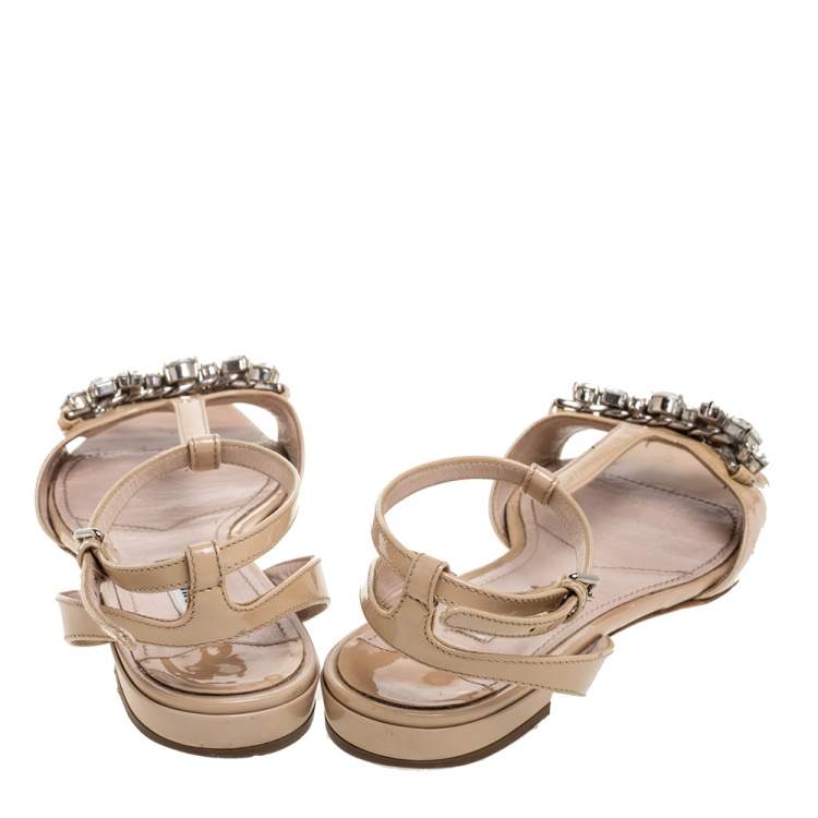 Pre Owned Miu Miu Beige Patent Leather Crystal Embellished T Strap Flat Sandals Size 36