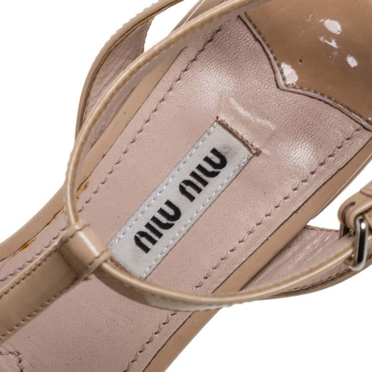 Pre Owned Miu Miu Beige Patent Leather Crystal Embellished T Strap Flat Sandals Size 36