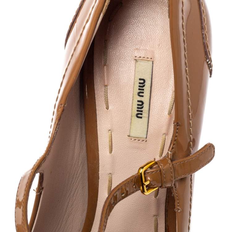 مملوكة مسبقًا Miu Miu Brown Patent Leather Penny Loafer Platform Pumps Size 37.5