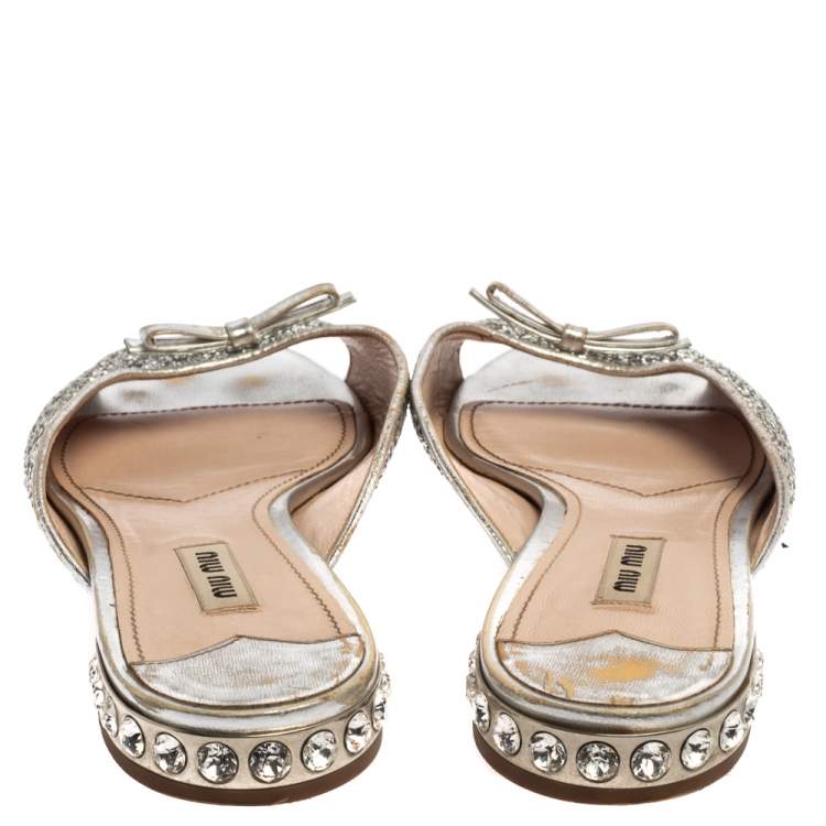 Pre Owned Miu Miu Metallic Silver Glitter Bow Detail Crystal Embellished Flat Slides Size 39