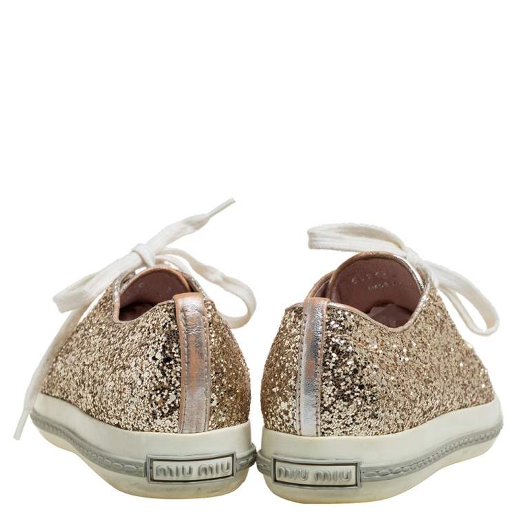 Pre Owned Miu Miu Gold Glitter Crystal Embellished Metal Cap Toe Low Top Sneakers Size 37