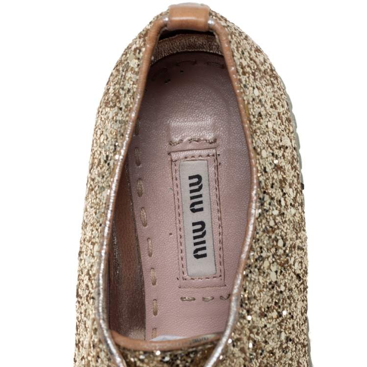 Pre Owned Miu Miu Gold Glitter Crystal Embellished Metal Cap Toe Low Top Sneakers Size 37