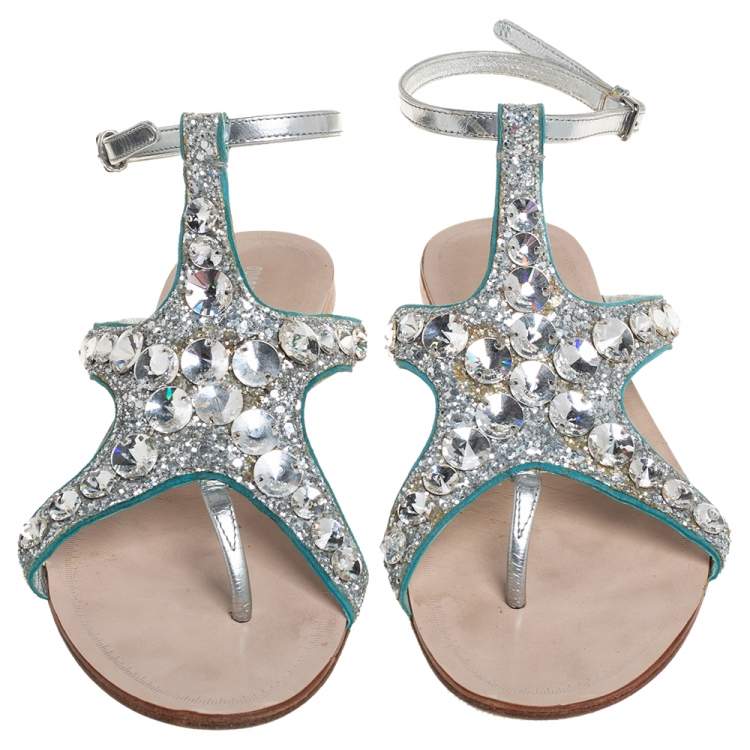 Pre Owned Miu Miu Silver Glitter And Leather Crystal Embellished Flat Ankle Strap Sandals Size 38