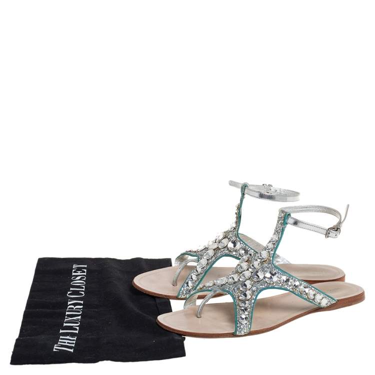 Pre Owned Miu Miu Silver Glitter And Leather Crystal Embellished Flat Ankle Strap Sandals Size 38