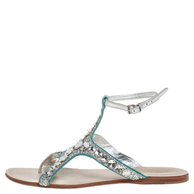 Pre Owned Miu Miu Silver Glitter And Leather Crystal Embellished Flat Ankle Strap Sandals Size 38
