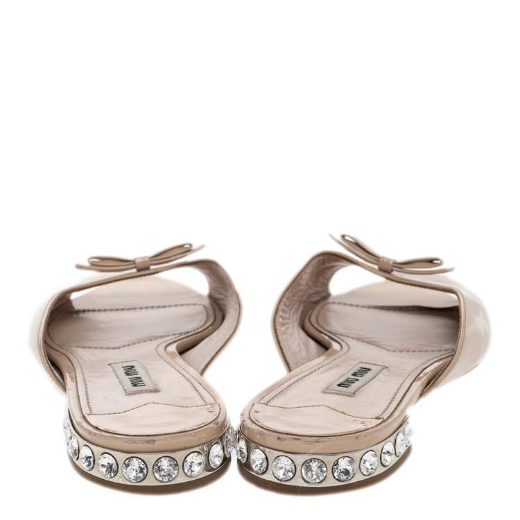 Pre Owned Miu Miu Beige Patent Leather Bow Crystal Embellished Flat Slides Size 37