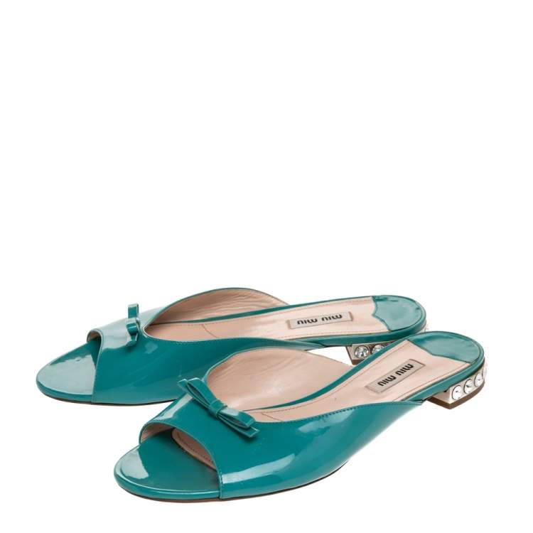 Pre Owned Miu Miu Blue Patent Leather Bow Crystal Embellished Heel Flat Slides Size 39