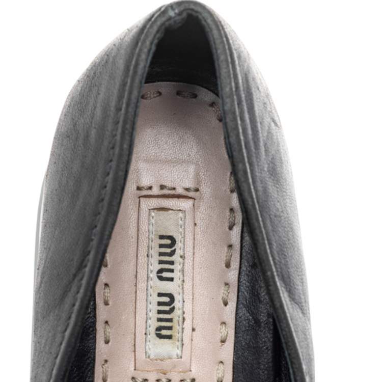 Pre Owned Miu Miu Black Leather Knot Bow Skate Metal Cap Toe Slip On Sneakers Size 38