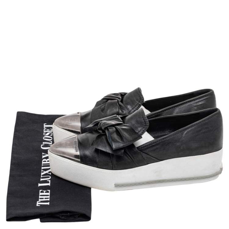 Pre Owned Miu Miu Black Leather Knot Bow Skate Metal Cap Toe Slip On Sneakers Size 38