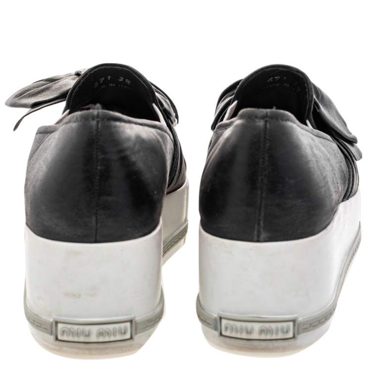 Pre Owned Miu Miu Black Leather Knot Bow Skate Metal Cap Toe Slip On Sneakers Size 38